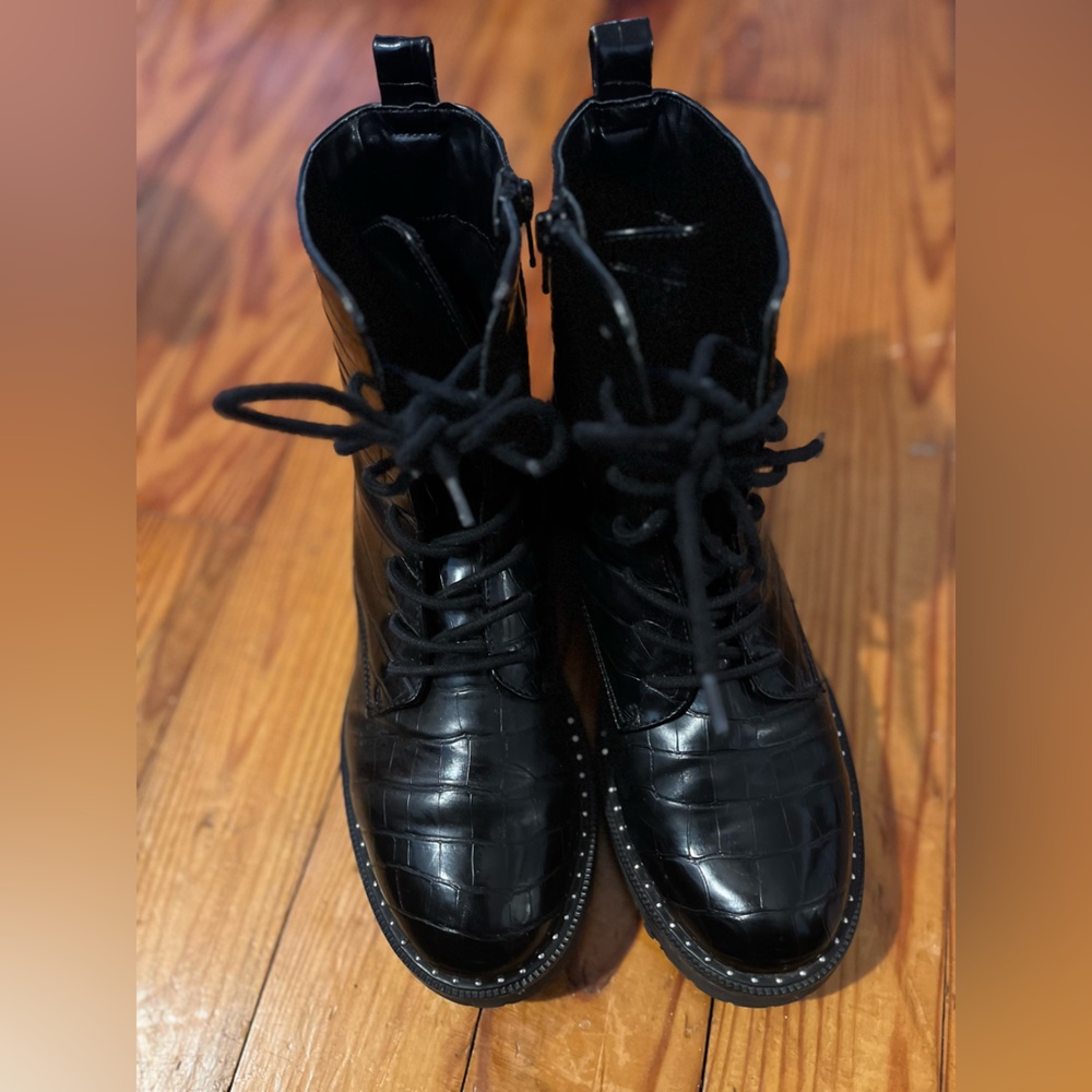 Women’s Gently worn combat boots
Patent leather